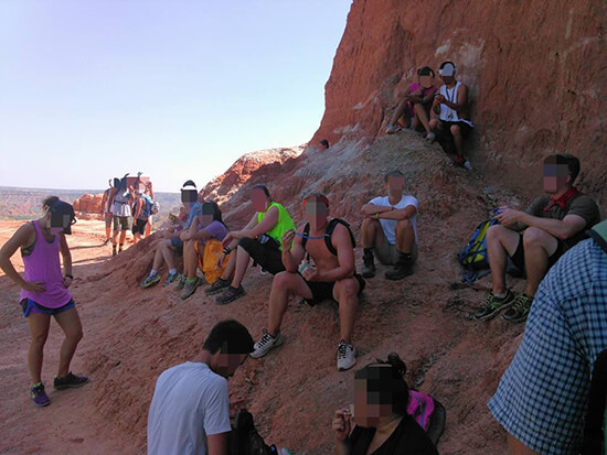 People resting while hiking